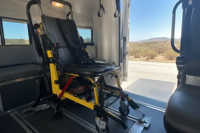 Stair chair secured inside a medical transport van in Queen Creek, AZ.