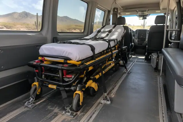 Stretcher secured inside a medical transport van in Apache Junction, AZ.