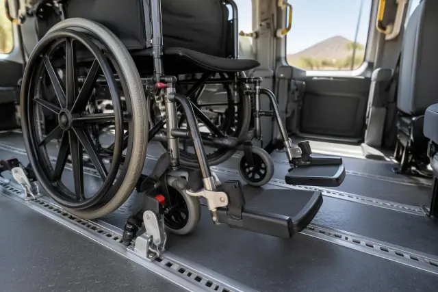 Wheelchair brakes and footrests checked for transport in Mesa, AZ.