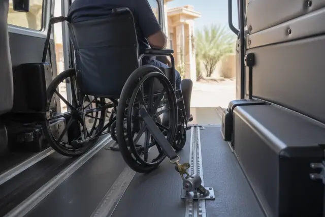 Wheelchair transport van interior with a secure restraint latch in Gilbert, AZ.