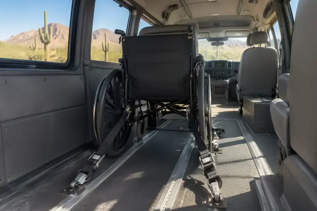Padded van interior with wheelchair securement tie-downs in Gold Canyon, AZ.