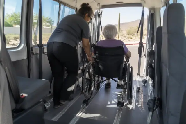 Driver's progress photo of wheelchair transportation for seniors in Mesa, AZ, showing secure floor tracks.