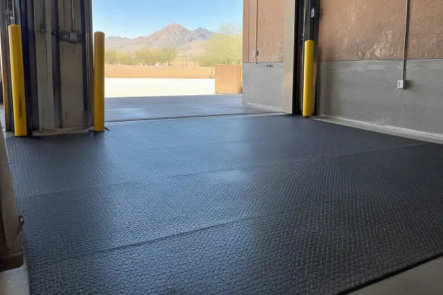 Anti-fatigue rubber flooring installed in an industrial shipping zone in Apache Junction, AZ.