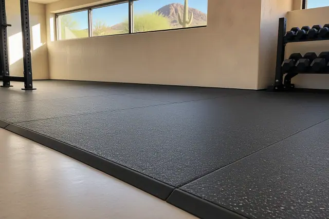 Anti-fatigue rubber flooring installed under barbell racks in Paradise Valley, AZ.