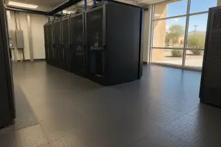 Interlocking anti-static rubber tiles installed around server racks in Mesa, AZ.