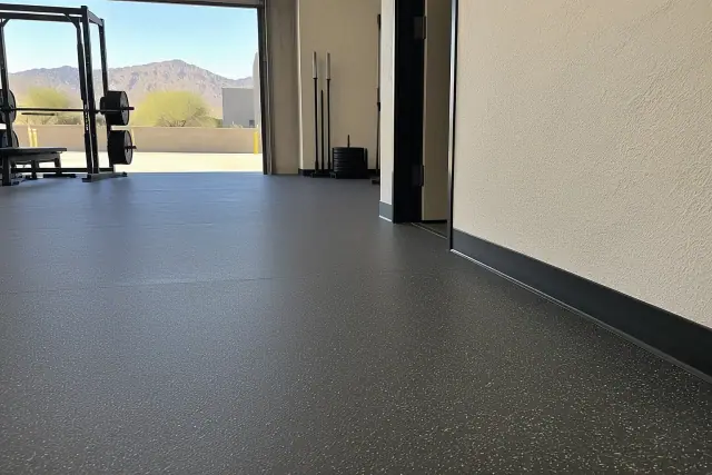 Commercial rubber flooring in a Mesa, AZ gym with clean edge-to-edge seaming and a matte finish.