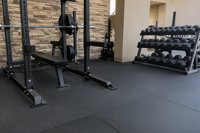 Commercial rubber flooring installed under heavy barbell racks in Fountain Hills, AZ.