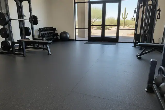 Commercial rubber flooring with tight seams and clean edges in a gym in Mesa, AZ.