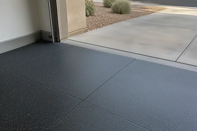 Garage rubber flooring installed in a residential vehicle bay in Mesa, AZ.