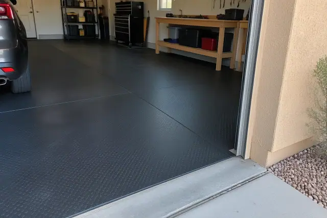 Heavy-duty rubber flooring installed in a residential garage in Tempe, AZ.