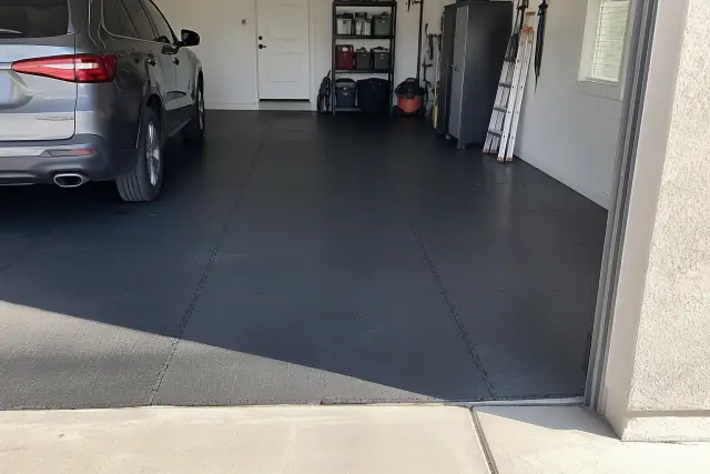 Interlocking heavy-duty rubber flooring installed in a garage in Chandler, AZ.