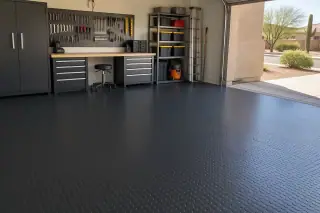 Heavy-duty rubber flooring covering a garage concrete floor in Mesa, AZ.