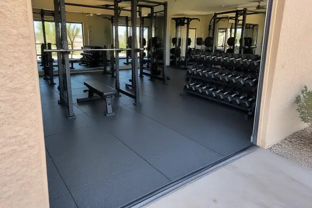 Rubber floor tile installation in a Mesa, AZ commercial gym and weight room.