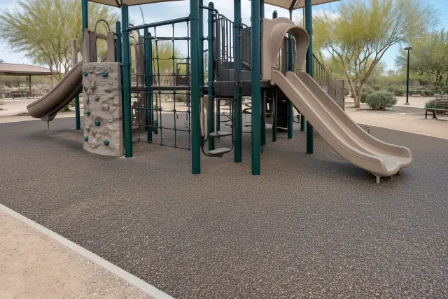 Poured rubber safety surfacing at a public park playground in Mesa, AZ.
