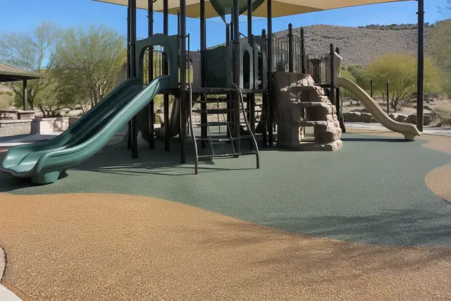 Poured-in-place rubber flooring at a recreation park play structure in Fountain Hills, AZ.