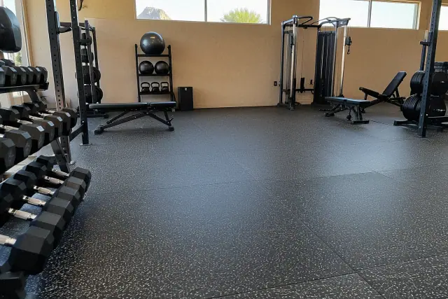 Recycled rubber flooring tiles installed at a commercial fitness facility in Mesa, AZ.