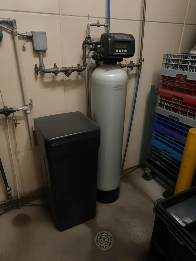 Industrial water softener system repaired in an Ahwatukee, AZ restaurant storage room.