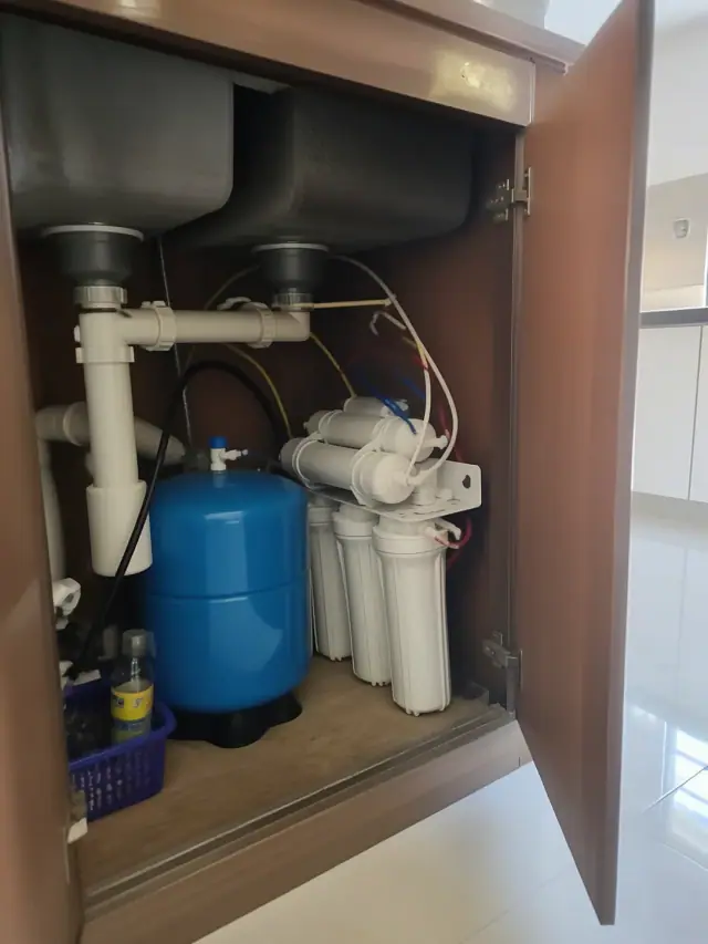 Reverse osmosis system installed under a kitchen sink in a home in Mesa, AZ.