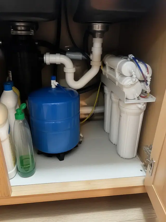 Reverse osmosis water filtration system installed under a kitchen sink in a home in Mesa, AZ.