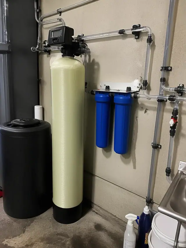 Water softener and filtration system installed in a restaurant utility room in Chandler, AZ.