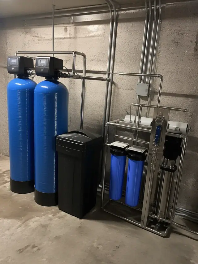 Commercial water softener and reverse osmosis system installation in a mechanical room in Mesa, AZ.