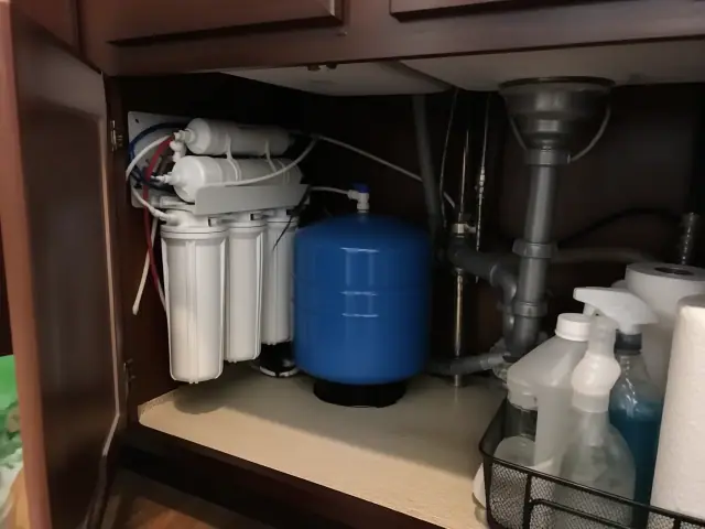Reverse osmosis system installed under a kitchen sink in Scottsdale, AZ.