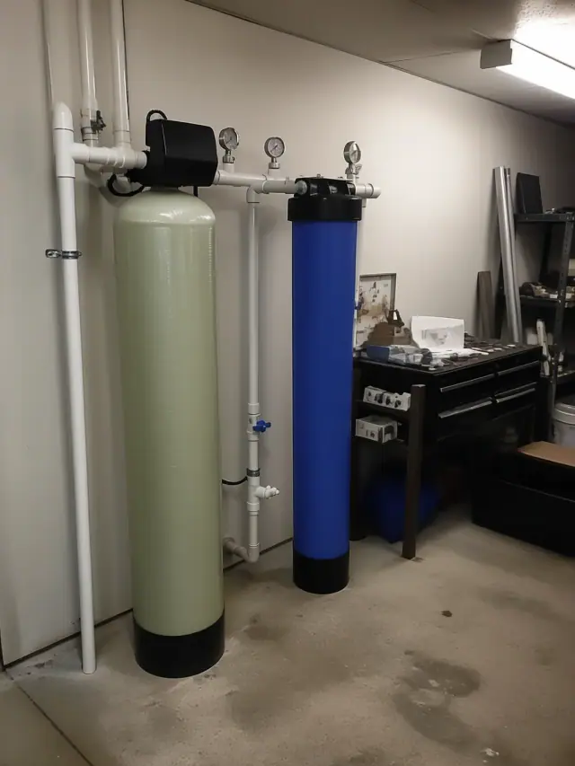 Commercial water softener and filtration system installed in a service room in Peoria, AZ.