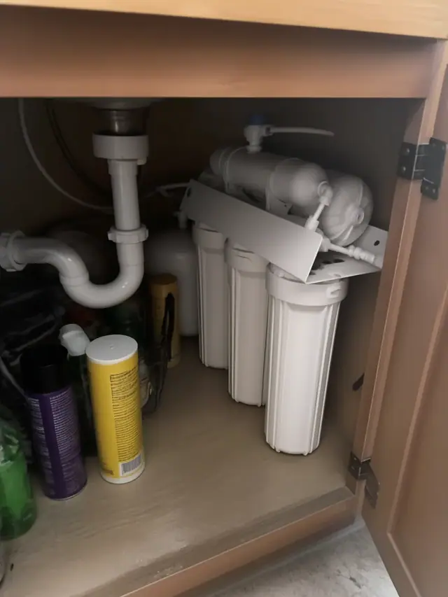 New reverse osmosis water filtration system installed under a kitchen sink in Apache Junction, AZ.