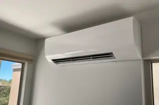 Sanitized indoor mini split unit with clean vents in a Phoenix, AZ home.