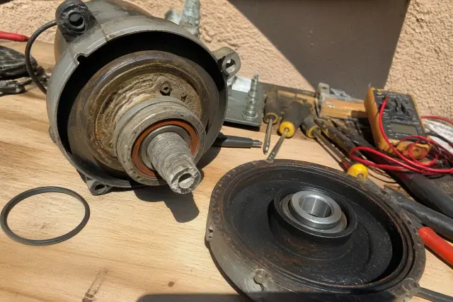Disassembled mechanical component with wear for a repair guide in Phoenix, AZ.
