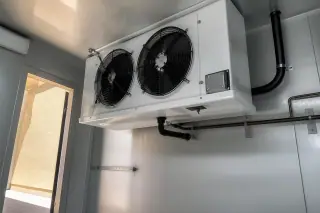 Finished evaporator coil assembly inside a walk-in commercial refrigerator in Phoenix, AZ.