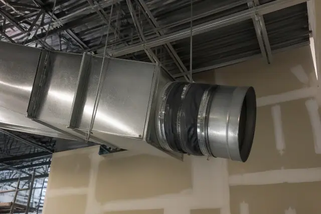Flexible ductwork connections installed on galvanized steel industrial ductwork at a job site in Phoenix, AZ.