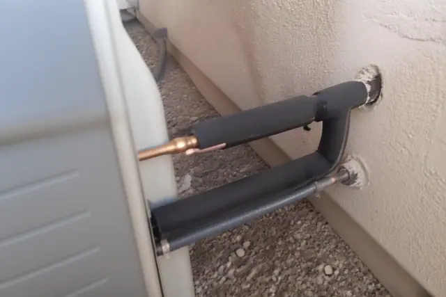 Insulated copper refrigerant lines on an indoor HVAC unit at a jobsite in Phoenix, AZ.