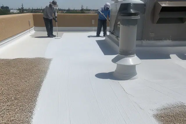 Freshly applied acrylic roof coating with roller texture around a rooftop HVAC unit at a job site in Phoenix, AZ.