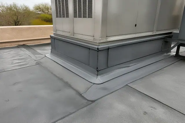 Freshly heat-welded roofing membrane around an HVAC unit on a commercial rooftop in Surprise, AZ.