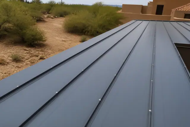 Metal roofing panels with industrial fasteners on a commercial building in Goodyear, AZ.