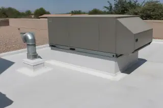 Finished membrane roofing detailing around a large ventilation unit near a stucco parapet in Phoenix, AZ.