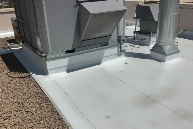 TPO membrane roof replacement around an HVAC unit on a commercial building in Phoenix, AZ.