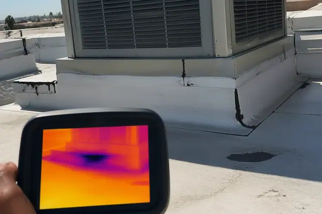Thermal imaging scan showing moisture under a roofing membrane at a job site in Phoenix, AZ.