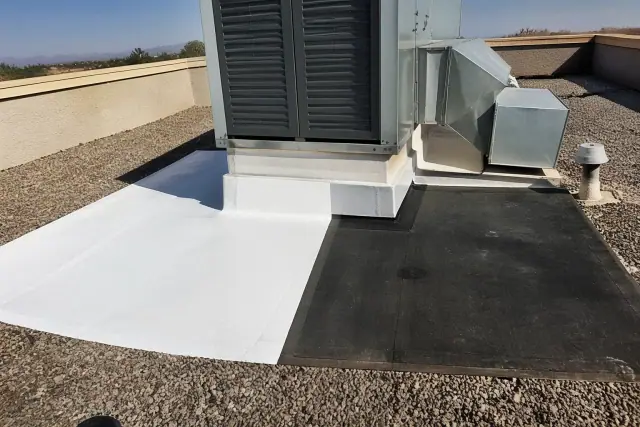 Side-by-side white TPO membrane and black bitumen roof samples next to a rooftop HVAC unit in Phoenix, AZ.