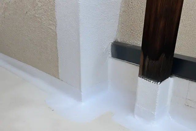 Elastomeric coating applied to a parapet wall corner on a commercial building in Phoenix, AZ.