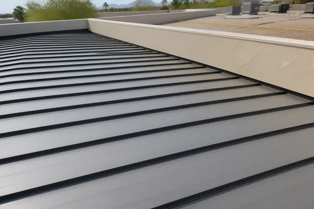 Standing seam metal roofing panels on a commercial building roof in Phoenix, AZ.