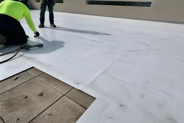 TPO membrane roof repair with heat-welded seams on a rooftop in Phoenix, AZ.