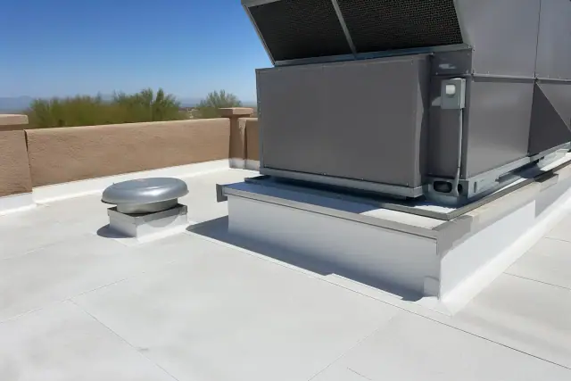 TPO roofing membrane detailing around a ventilation unit on a commercial rooftop in Buckeye, AZ.