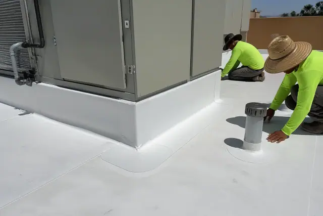 TPO roofing membrane and heat-welded seams installed around a rooftop vent on a commercial building in Phoenix, AZ.