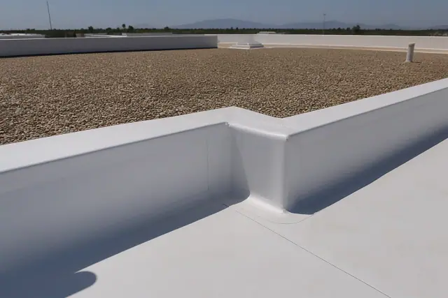 White TPO roofing membrane installation on a commercial building in Goodyear, AZ, showing heat-welded seams.