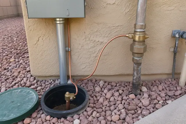 Grounding and bonding installation at a residential service upgrade in Phoenix, AZ.