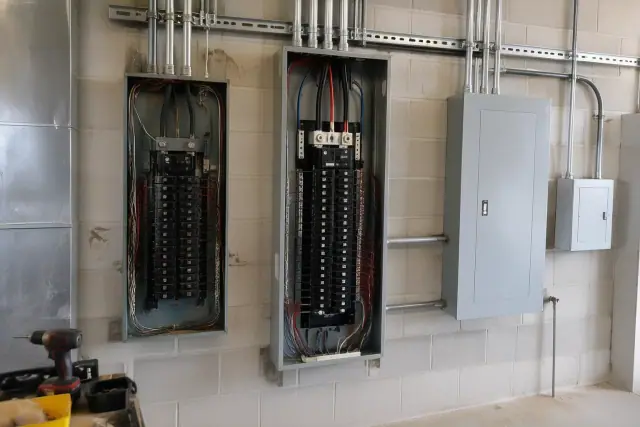 Zinsco electrical panel replacement with new wiring in a commercial utility room in Phoenix, AZ.