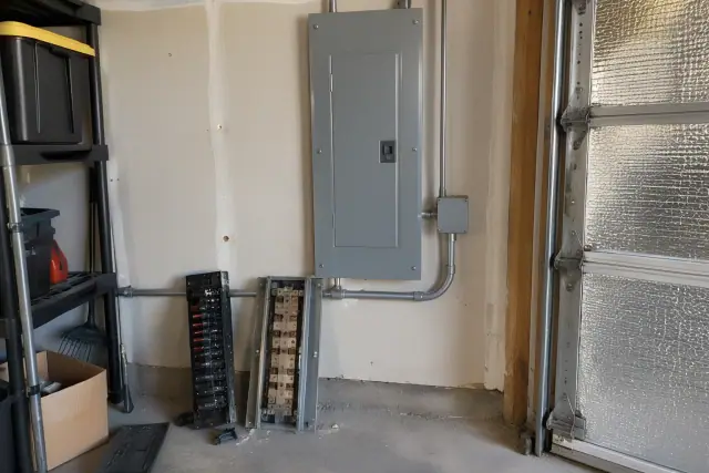 Zinsco electrical panel replacement in a residential garage in Glendale, AZ.