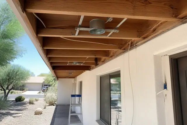 Ceiling joist cavity with wiring prepared for recessed lighting installation in a Phoenix, AZ home.